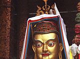 Tibet Lhasa 02 07 Jokhang inside Padmasambhava The inner sanctum of the Jokhang houses its most important images and chapels. In the central area is a 6m statue of Padmasambhava (Guru Rinpoche), the 8th century master who established Buddhism in Tibet. He has a curly moustache and holds a thunderbolt in his right hand, a skull cap in his left hand, and a staff with three heads � one shrunken, one severed and one skull � in the crook of his left arm. He has a ritual dagger in his belt. Although there�s no photography allowed, here�s a photo from my 1993 trip.